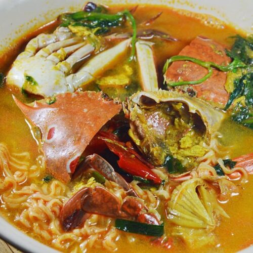 instant noodle with flower crab curry on bowl KERALI RESTAURANT & BAR KERALI RESTAURANT & BAR